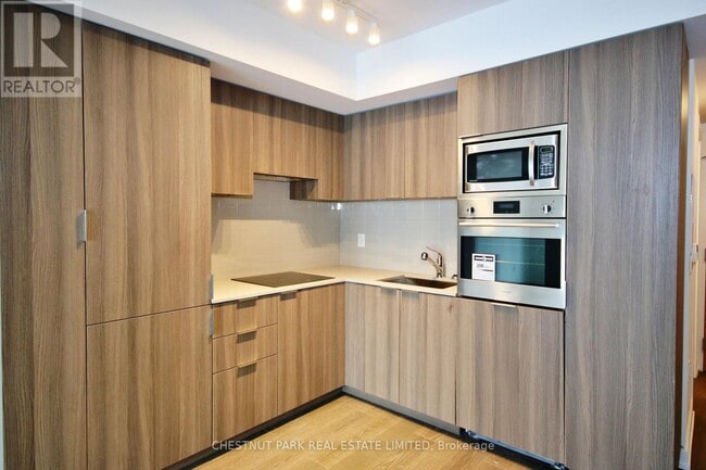 Building Photo - 11 Wellesley St W