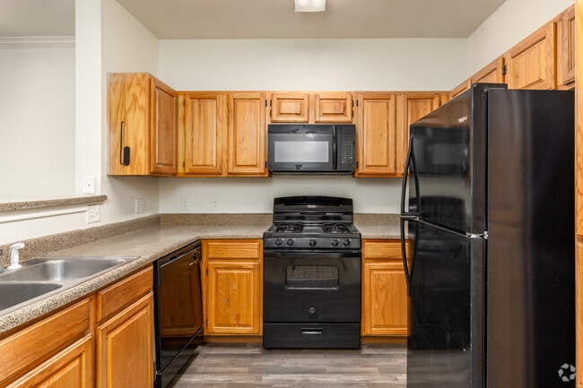 3BR, 2BA - 1,240SF - Kitchen - Skyway Villas