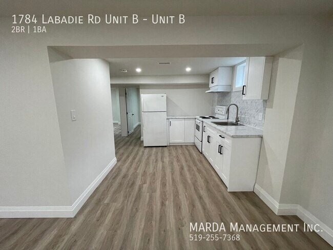 Building Photo - SPACIOUS & BRIGHT 2 BED/1 BATH LOWER UNIT + 40% UTILITIES