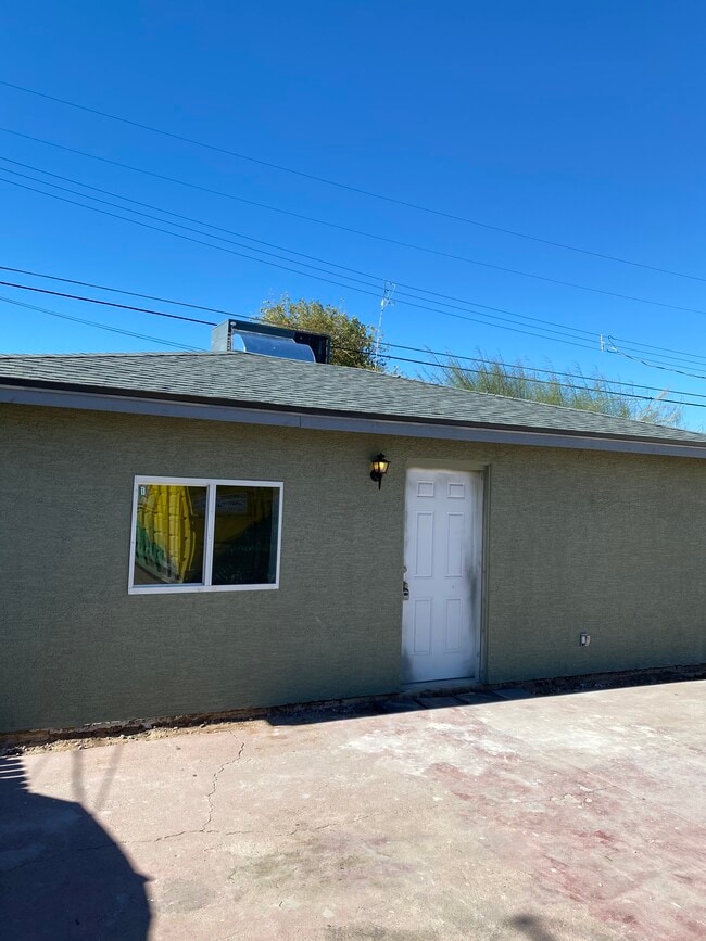 New windows & exterior paint - 215 N Pima Rd