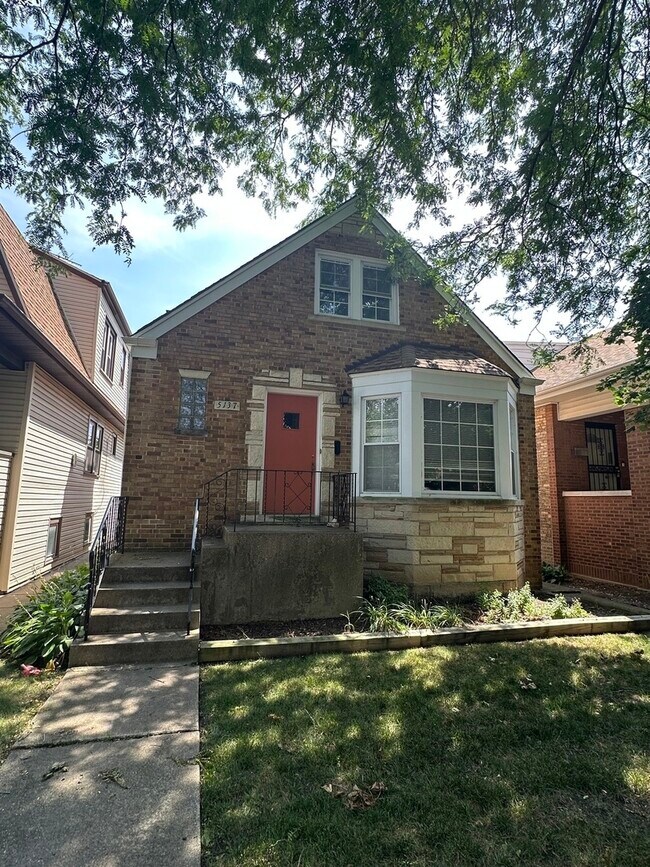Foto del edificio - 5137 N Lowell Ave