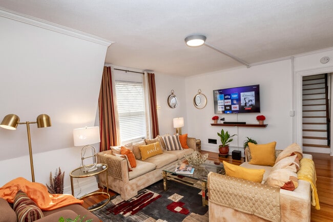 Living room - 60 inch ROKU TV - 1614 Genesee St