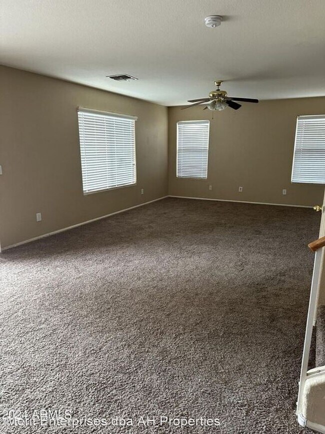 Building Photo - 4 br, 2.5 bath House - 42303 W CHAMBERS DR