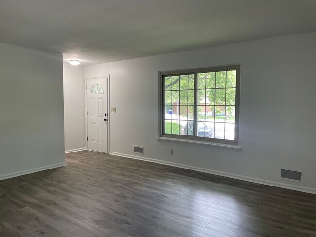Building Photo - {6621} Updated Brick Home + 1 Car Garage