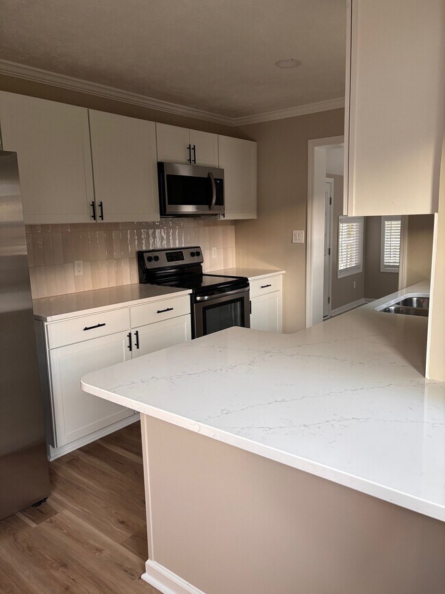 Foto del edificio - 5558 Quietwood Pl