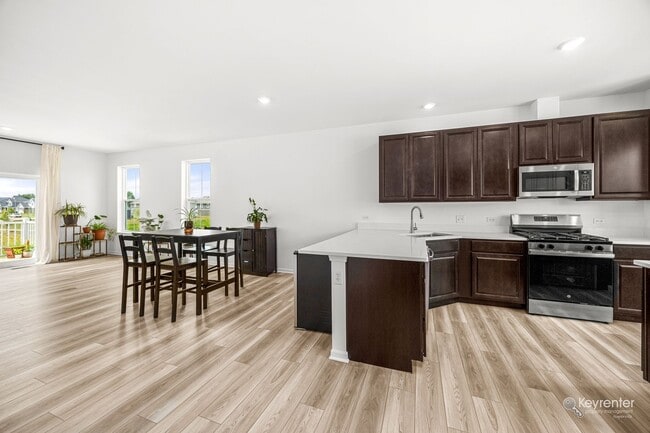 Building Photo - Brand-New End-Unit Townhome w/ Pond Views – Keller Farm, Plainfield!