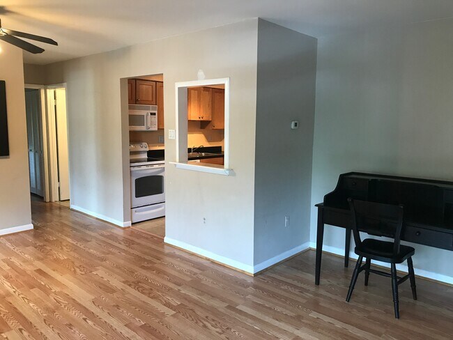 Living room looking into kitchen abs hallway - 8877 Tamebird Ct