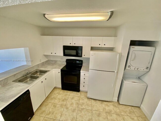 Building Photo - 2421 NW 56th Ave
