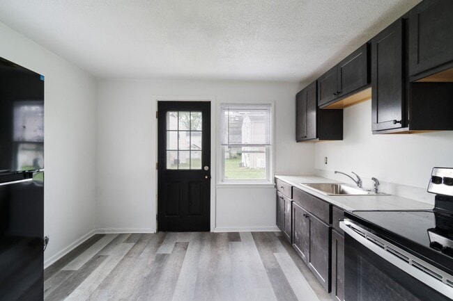 Building Photo - Available in June! 4-Bedroom Townhouse in Scenic Hills Homes - Midland, PA
