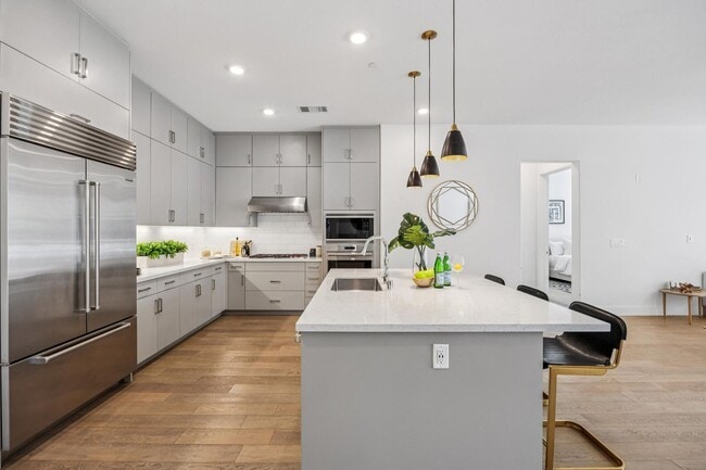 Building Photo - Luxury Single-Level Corner Residence with Wolf Kitchen & Private Garage
