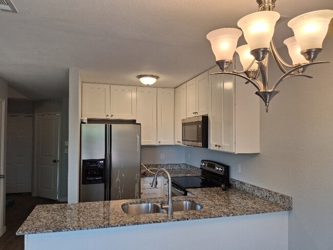 Photo - 4504-4506 Alamosa St Apartment