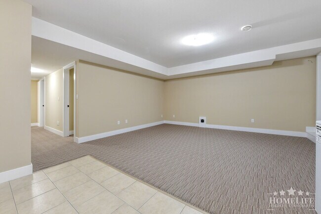 Photo du bâtiment - Bright & Spacious 2 Bed / 1 Bath Basement Suite in Clayton Heights – Perfect for Small Families