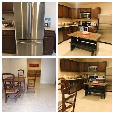 Kitchen, island, and dining table. - 6097 Deer Ridge Trl