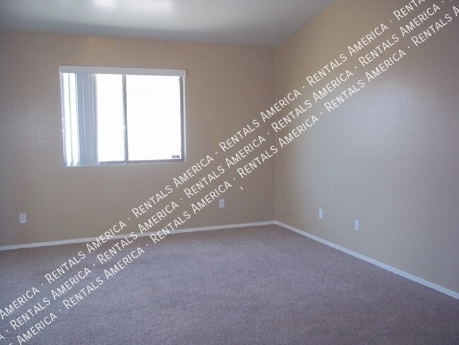 Building Photo - 6605 W Desert Ln
