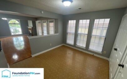 Building Photo - "Charming 3-Bedroom Retreat with Cozy Fireplace on Cedar Chest Drive!"