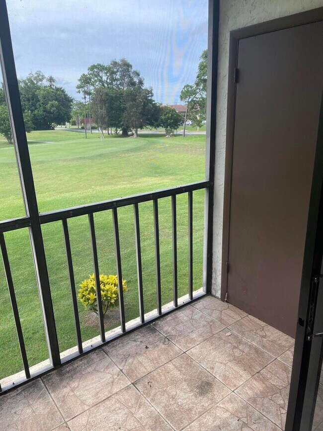 Building Photo - 7101  Golf Colony Court 201 Lake Worth Fl ...