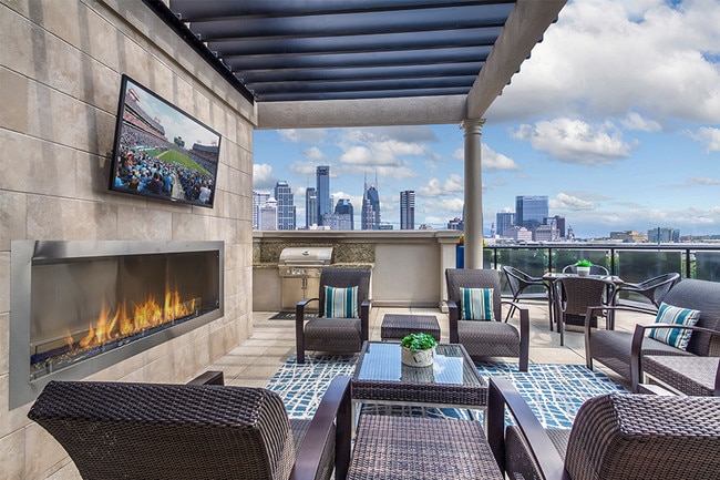 Rooftop lounge with outdoor fireplace, grill and amazing views of downtown - 2700 Charlotte Ave Apartments