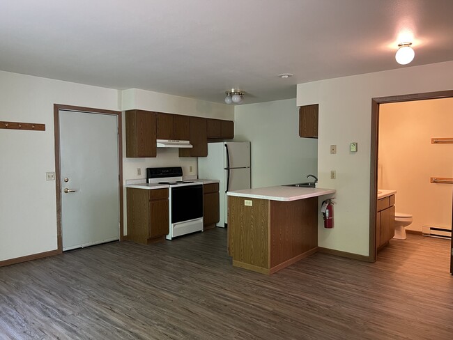 Kitchen and eat-in dining area. - 316 3rd Ave W