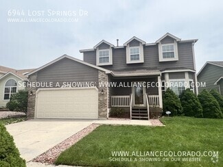 Building Photo - 6944 Lost Springs Dr