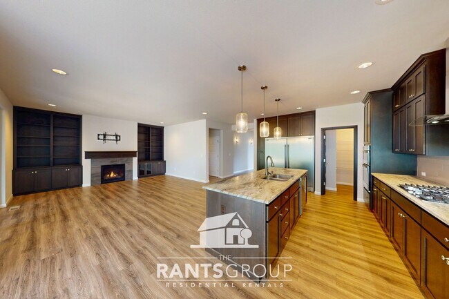 Building Photo - Luxury 4-Bedroom Home with 5-Car Garage & ...