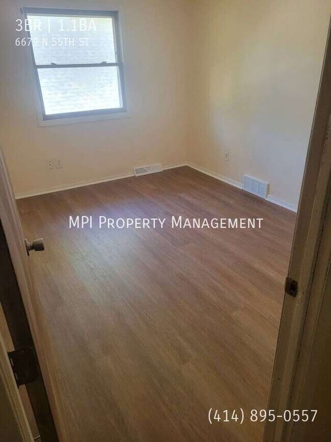 Building Photo - 6679 N 55th St