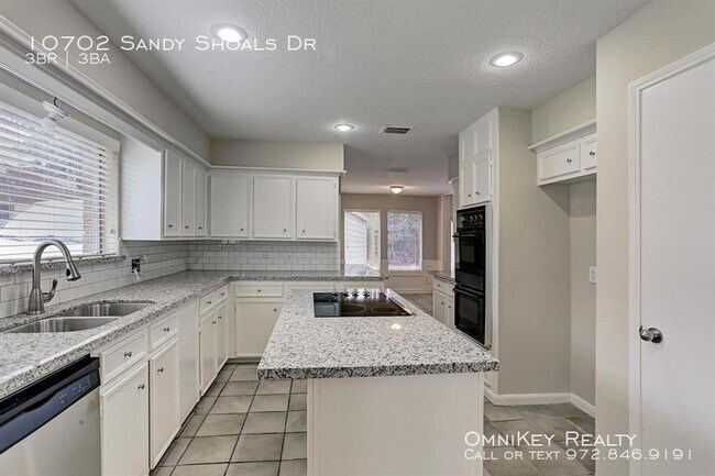Foto del edificio - 10702 Sandy Shoals Dr