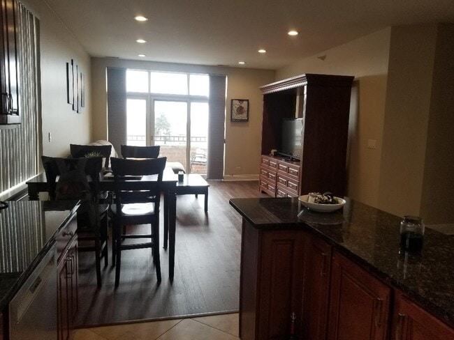 living room from kitchen - 4330 N Neva Ave