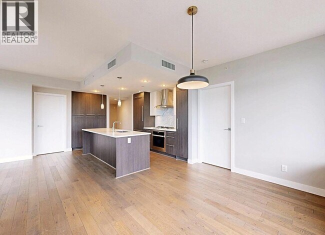 Photo du bâtiment - 677 W 41st Ave