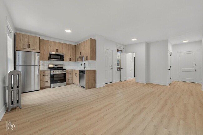 Foto del edificio - 6967 N Bell Ave