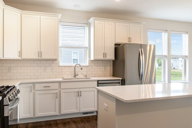 Building Photo - W218N16066 Tiger Lily Dr