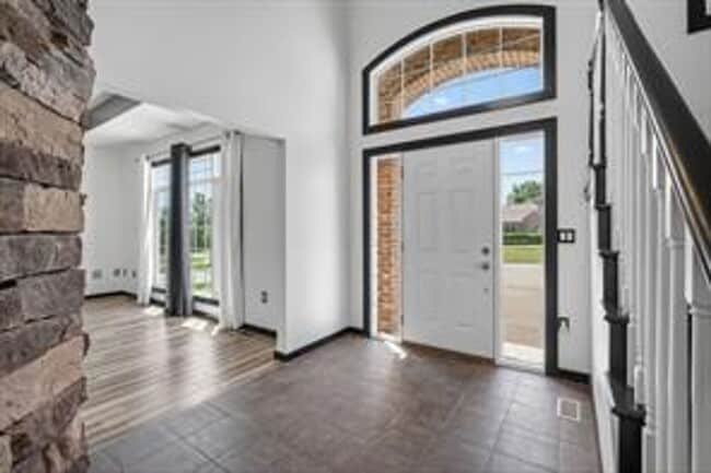 Building Photo - Spacious 5-Bed Walkout Home with Over 3,50...