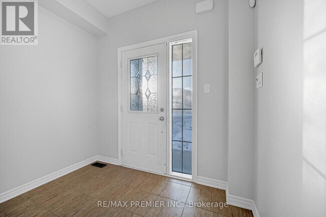 Photo du bâtiment - 68 Zachary Pl