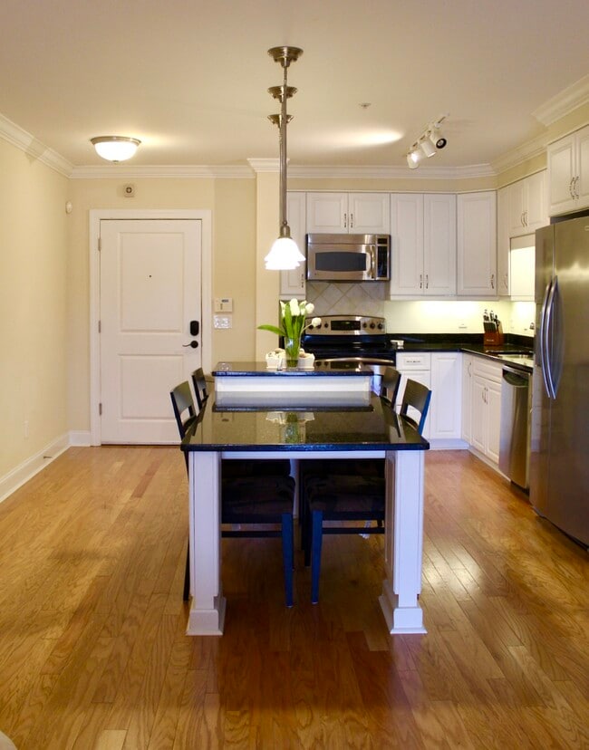 Photo - 6831 Main St Townhome