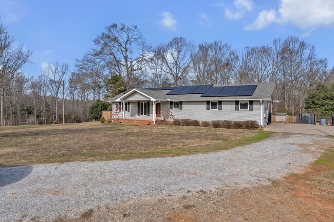 Photo - 3BR / 2BA Off-Grid Luxury Living with Large Fenced Lot and Solar Power $2297/mo rent Apartment