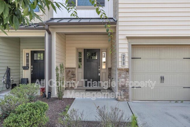 Foto del edificio - 208 Spring Flower Ln