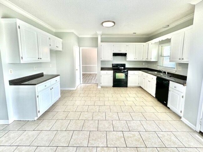 Building Photo - Now Leasing a Spacious 5 Bedroom 2.5 Bath ...