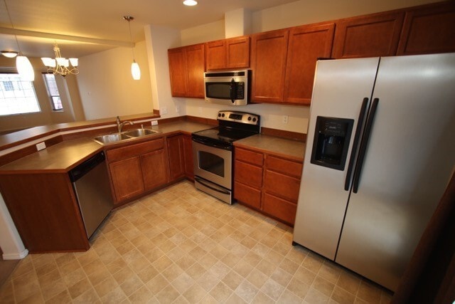 Building Photo - 3 Bedroom Condo close to JBER w/ Fenced Backyard!