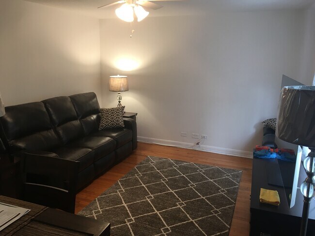 Plenty of room for a couch and tables. - 1163 S Oak Park Ave