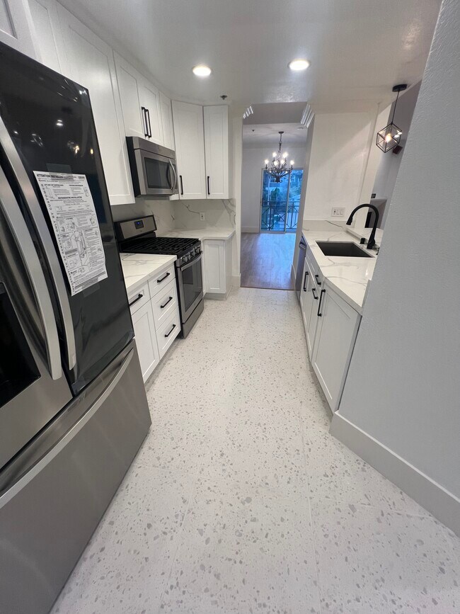 Extensive floor to ceiling cabinetry. - 1722 Malcolm Ave