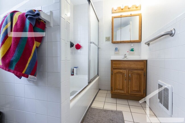 Building Photo - No Brokers Fee, Top Floor Unit, Porch, Laundry, Steps from the T Stop