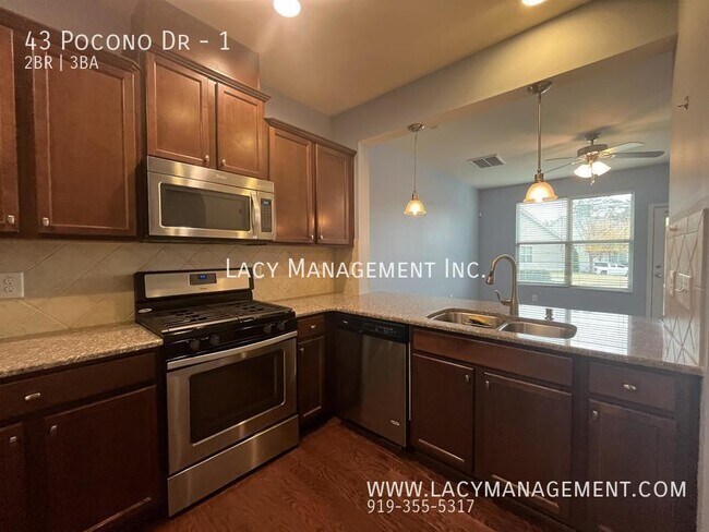 Building Photo - A Townhome Equipped with Modern Appliances