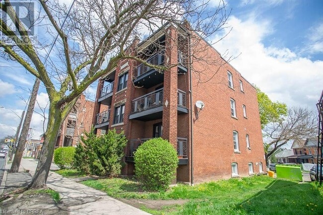 Building Photo - 1265 King St E