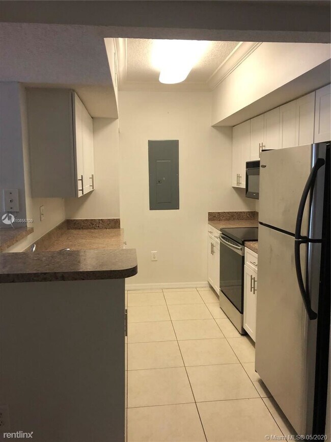 Building Photo - 3 br, 2 bath Condo - 12203 Pines Blvd