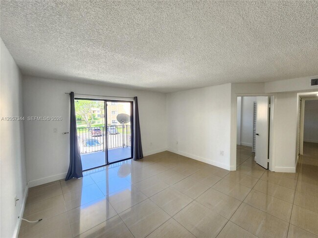 Building Photo - 9491 Palm Cir S