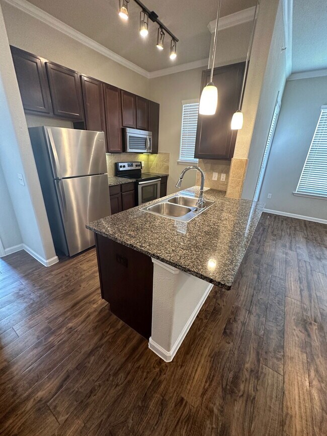 Foto del edificio - 27040 U.S. 380 Apt #106, Aubrey, TX 76227 - 1 BR 1 BA Condo