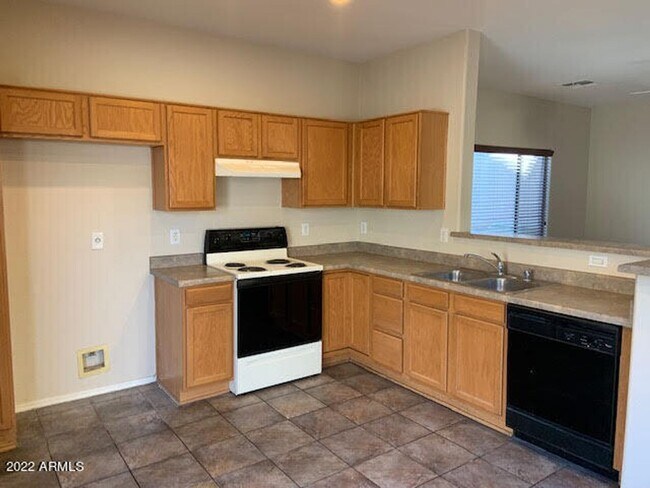 Building Photo - Charming 3 bedroom home in GATED community...