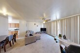 Located at 819 Brown St in Ann Arbor, MI, this one-bedroom, one-bathroom unit is thoughtfully laid out across a single floor. The combined living and dining area serves as the heart of the home, featuring carpet flooring, a ceiling fan with light fixture, and a wide bank of floor-to-ceiling vertical blinds that invite generous natural light into the space. The open layout comfortably accommodates both a seating area and a dining setup, creating a versatile and functional living environment.

The kitchen is positioned adjacent to the living area and features warm wood cabinetry, white countertops, tile flooring, and a double-basin sink. A window above the counter brings in additional natural light, making the space feel bright and practical. A pantry provides extra storage for kitchen essentials.

The bedroom is a well-proportioned retreat with carpet flooring, a window with vertical blinds, and a built-in closet with bifold doors offering ample storage. Additional closets throughout the unit further enhance storage capacity.

The bathroom includes a tiled tub-shower combination, a vanity with a large mirror, and overhead lighting. A hallway connects the main living spaces, completing the efficient and functional floor plan of this Ann Arbor home.