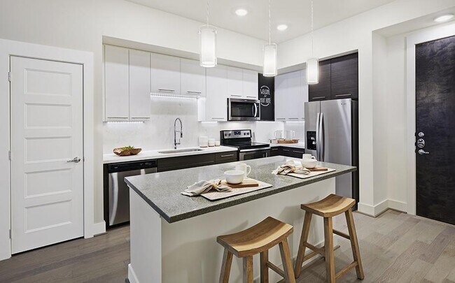 Foto del edificio - 2-Bedroom Bliss: Embrace the Art of Comfor...
