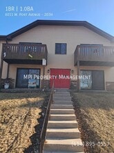 Building Photo - 6011 W Port Ave