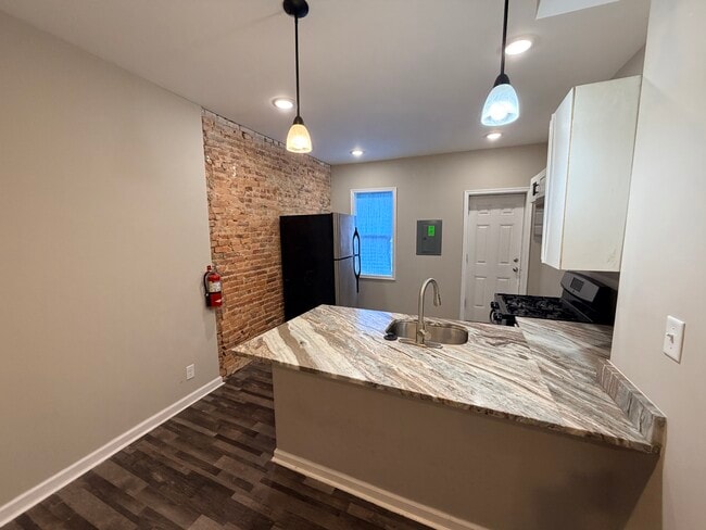 Kitchen & Exposed Brick Accent Wall - 4654 York Rd